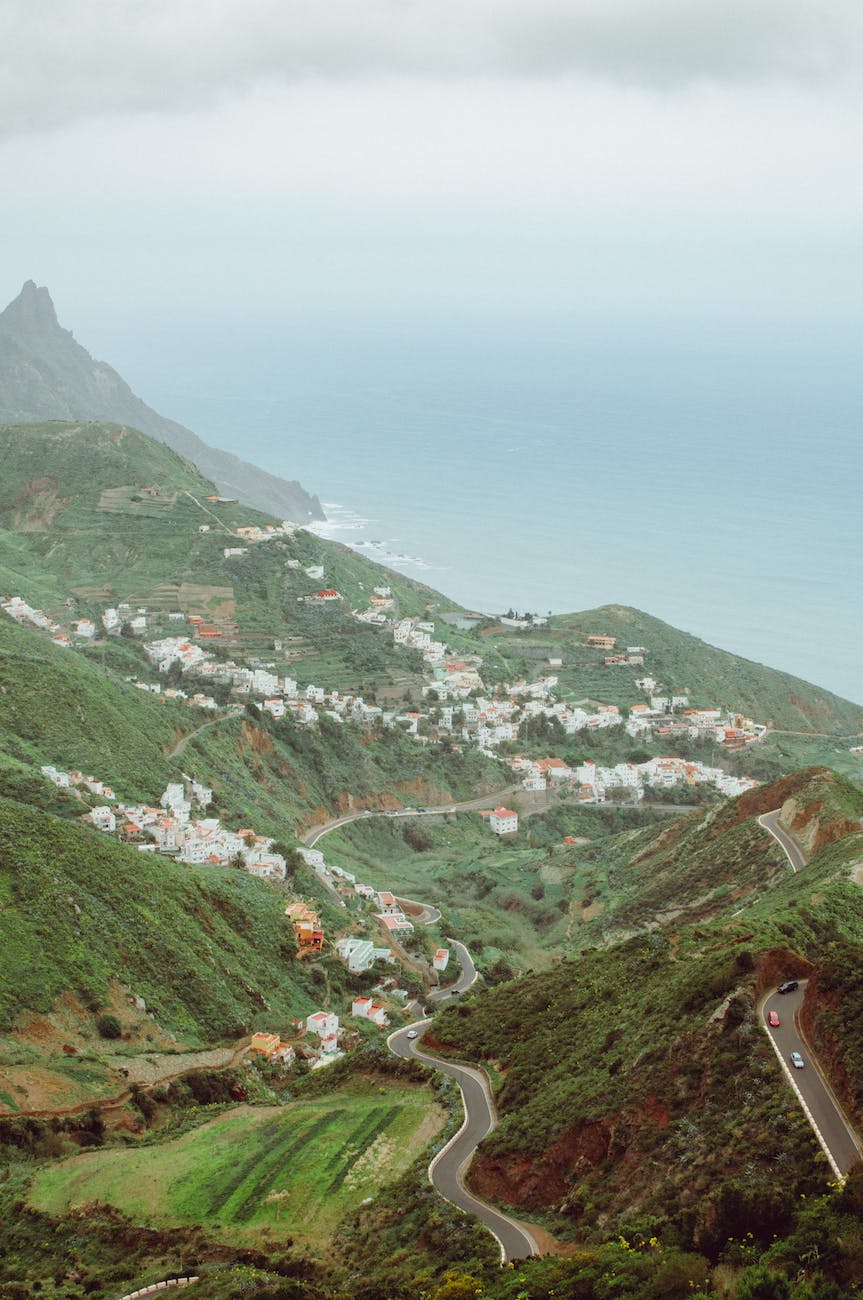 a shot of mountain landscape and mountain village tenerife