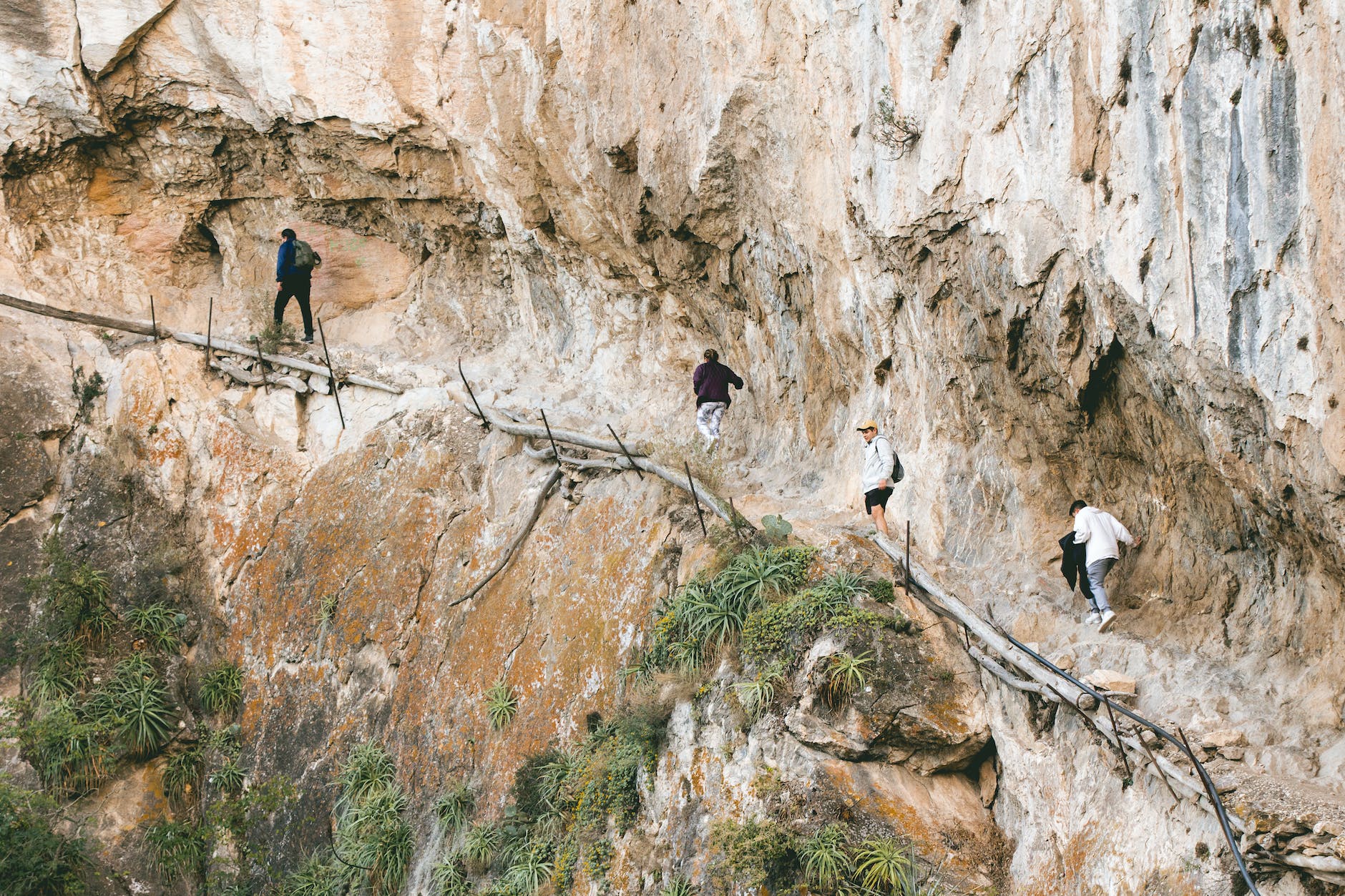 people on the hiking trail in caminito del rey in malaga spain