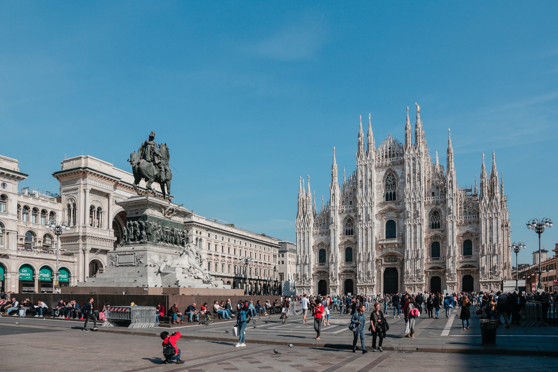 statue and cathedral in milan