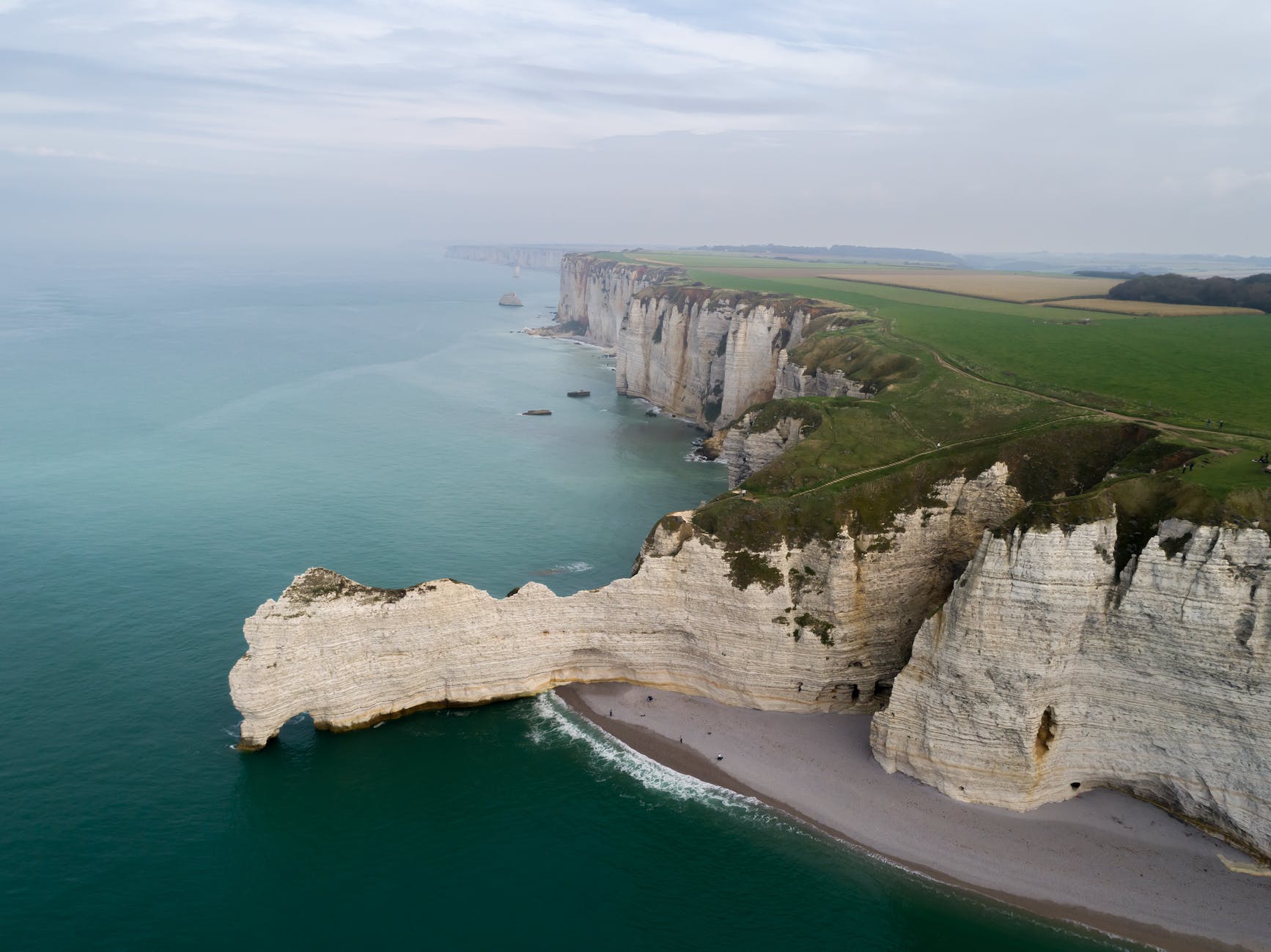 aerial view of natural rock formation on the beach