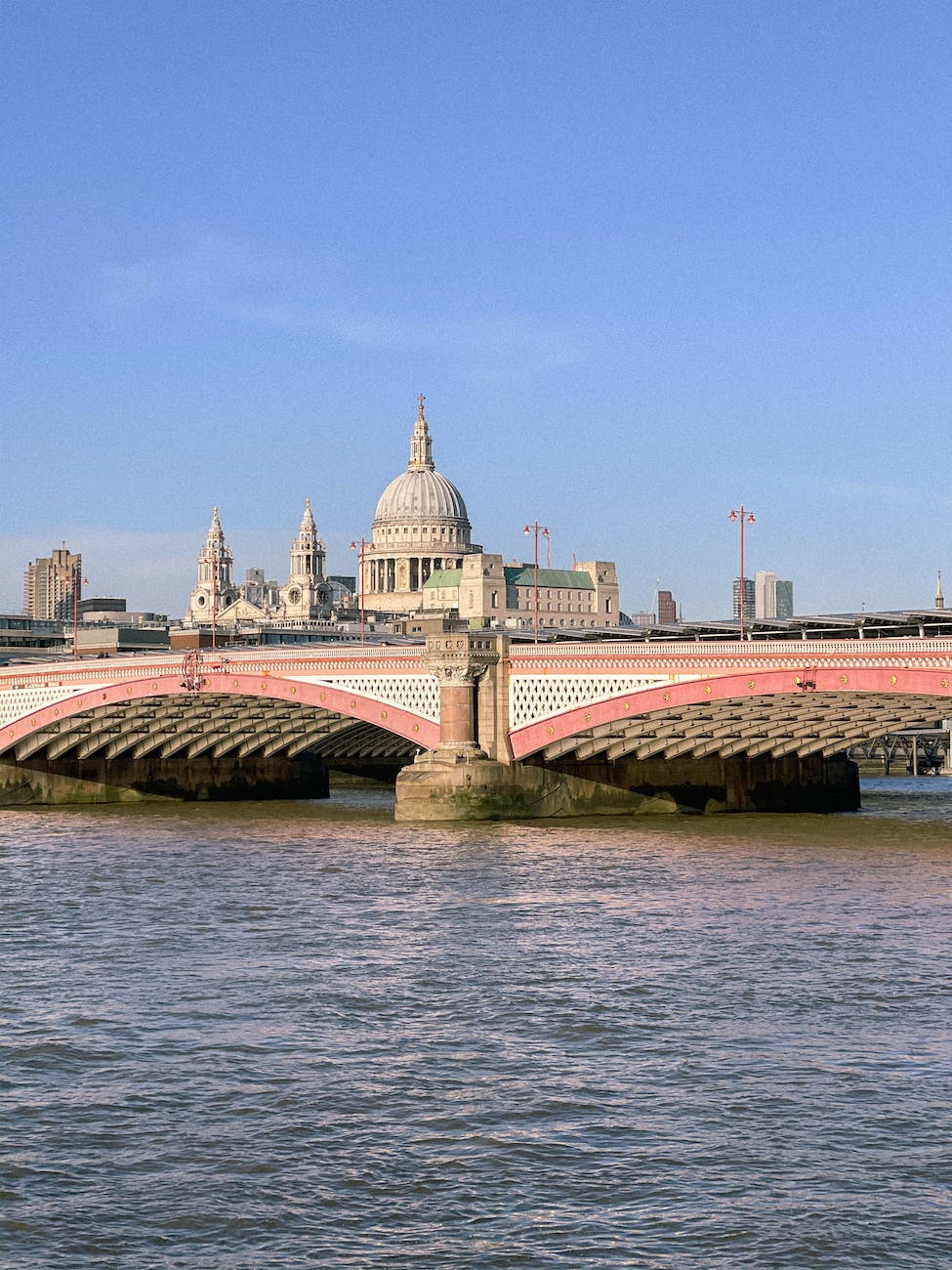 aged cathedral and bridge in old european city